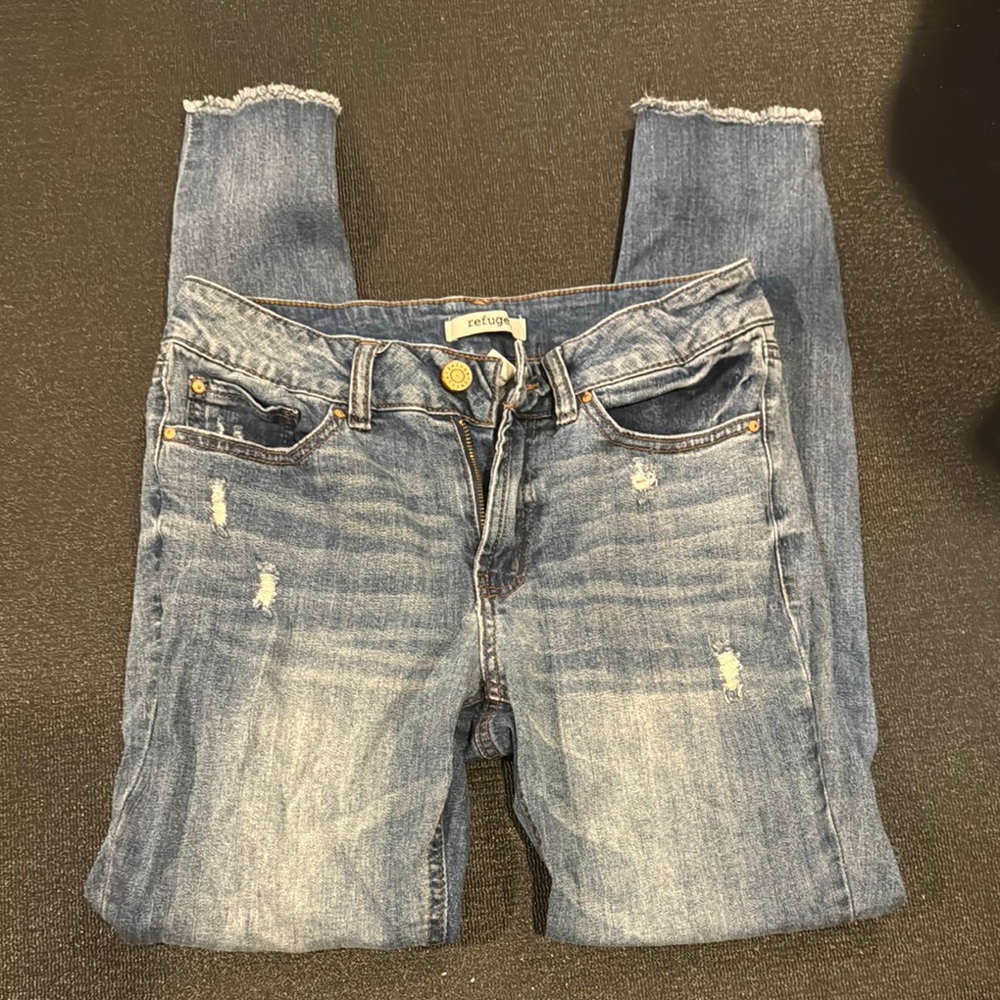 Refuge jeans with distressed bottoms